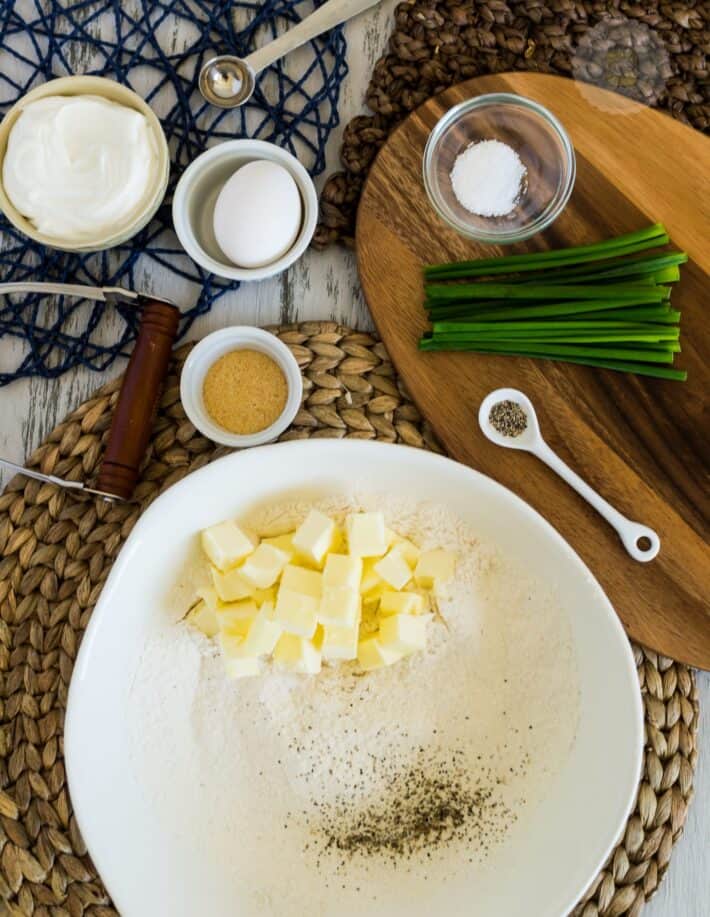 sticks of butter added to various ingredients ready to be prepared