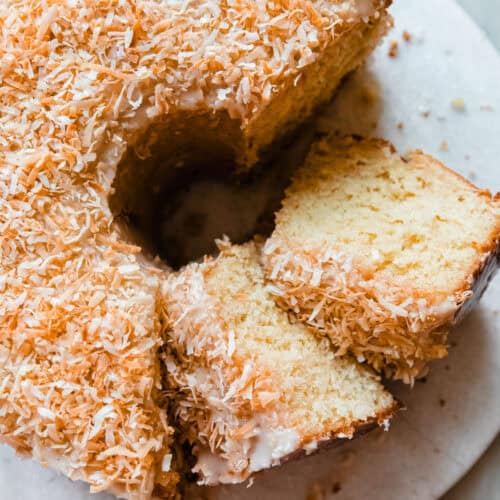 Louisiana crunch cake on marble with slices cut out
