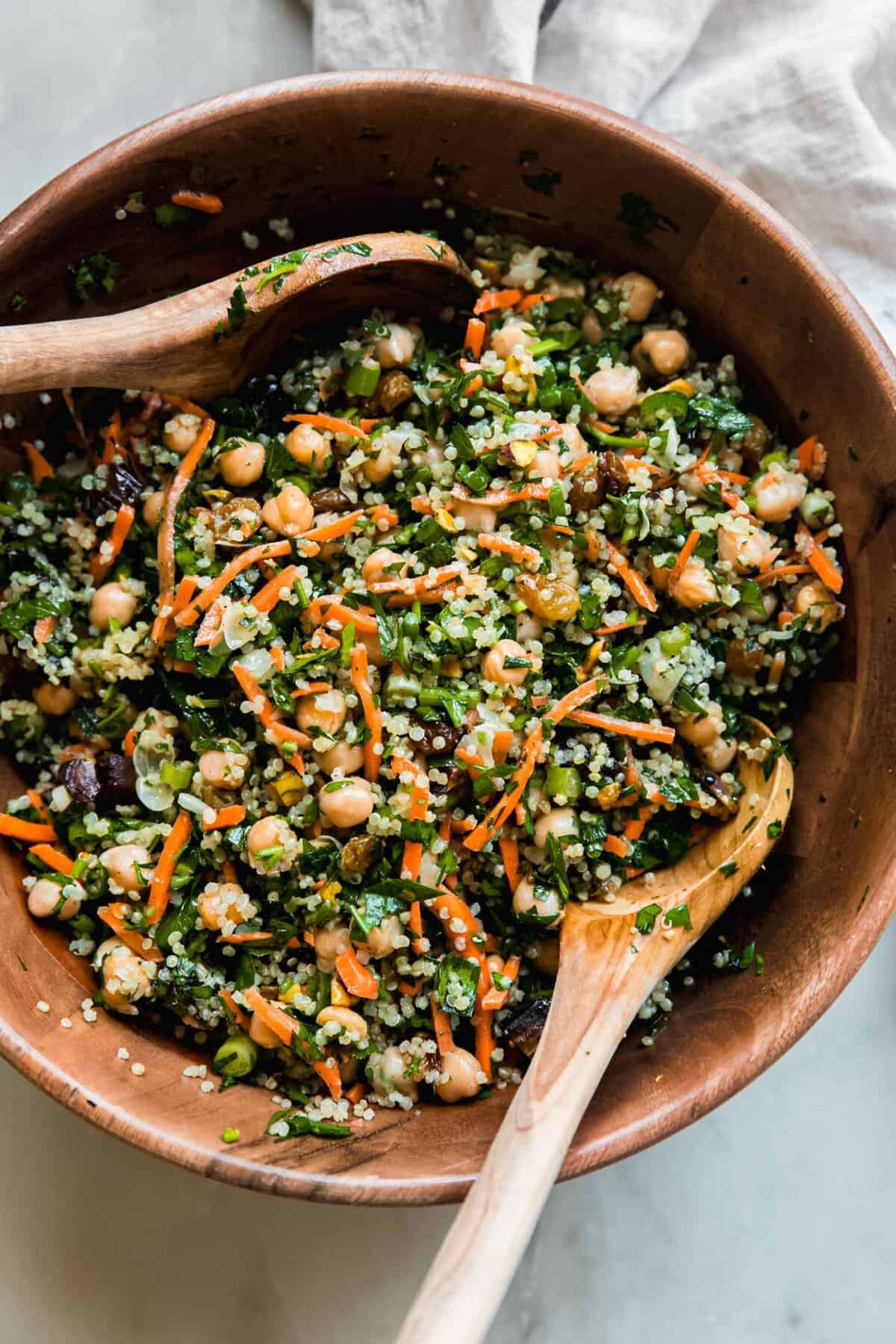 Quinoa power salad with chickpeas roasted sweet potato tahini dressing for healthy filling school potluck