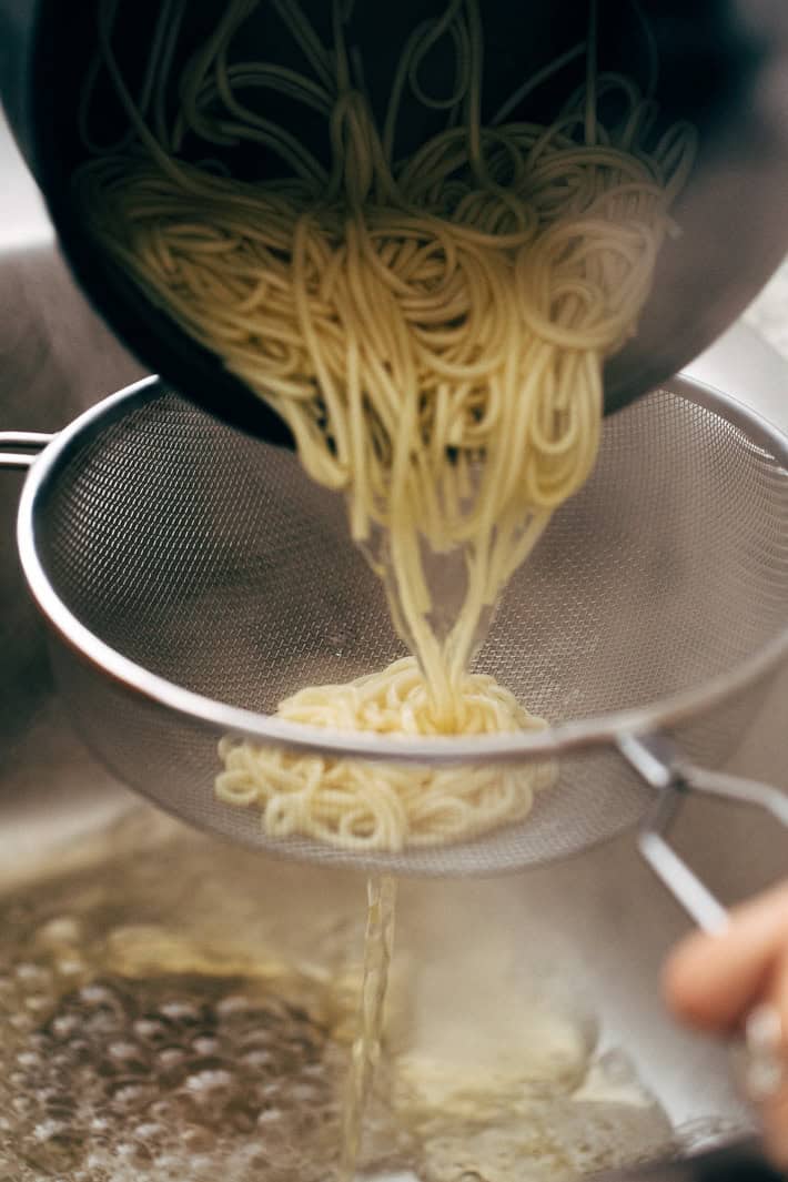 ramen noodles draining in sieve