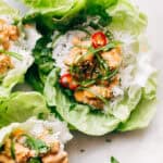 Bang Bang Chicken Lettuce Wraps - a homemade lettuce wrap stuffed with jasmine rice, sautéed chicken and tons of bang bang sauce! #bangbangchicken #bangbangsauce #bangbanglettucewraps #chickenlettucewraps | Littlespicejar.com