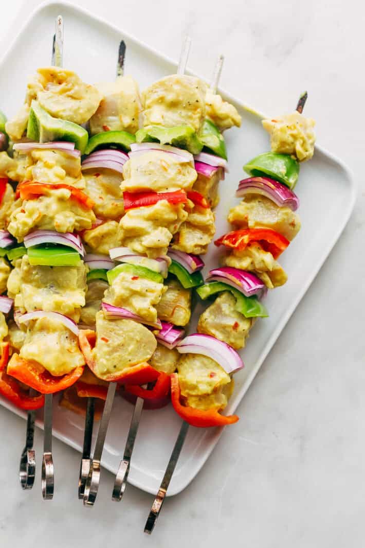 persian chicken skewers on plate