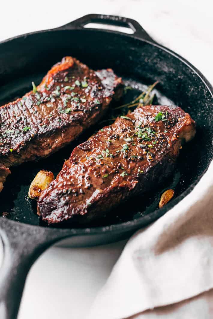 Cooked steak in skillet