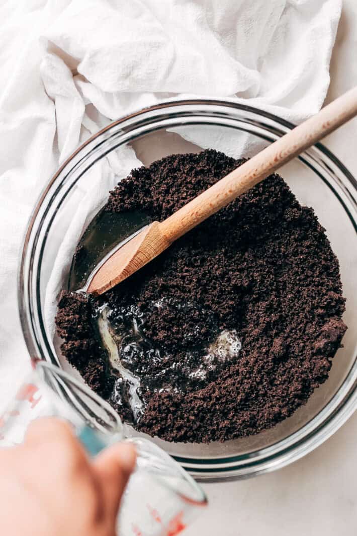 oreo cookie crumbs with melted butter
