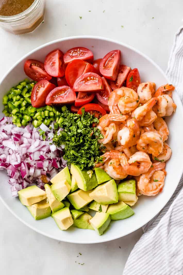 mexican shrimp salad ingredients in bowl