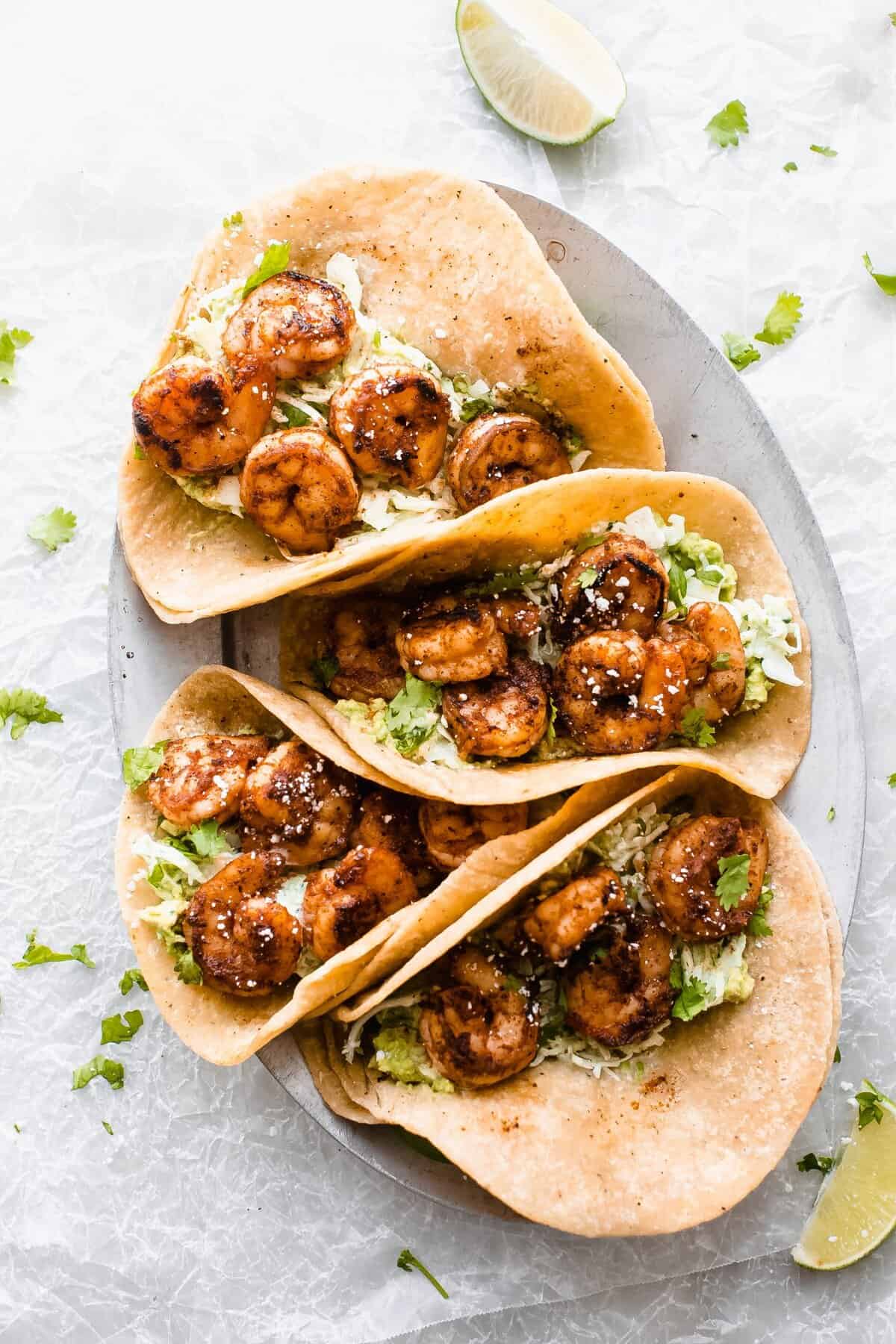 Blackened Shrimp Tacos with Smashed Avocados and Slaw