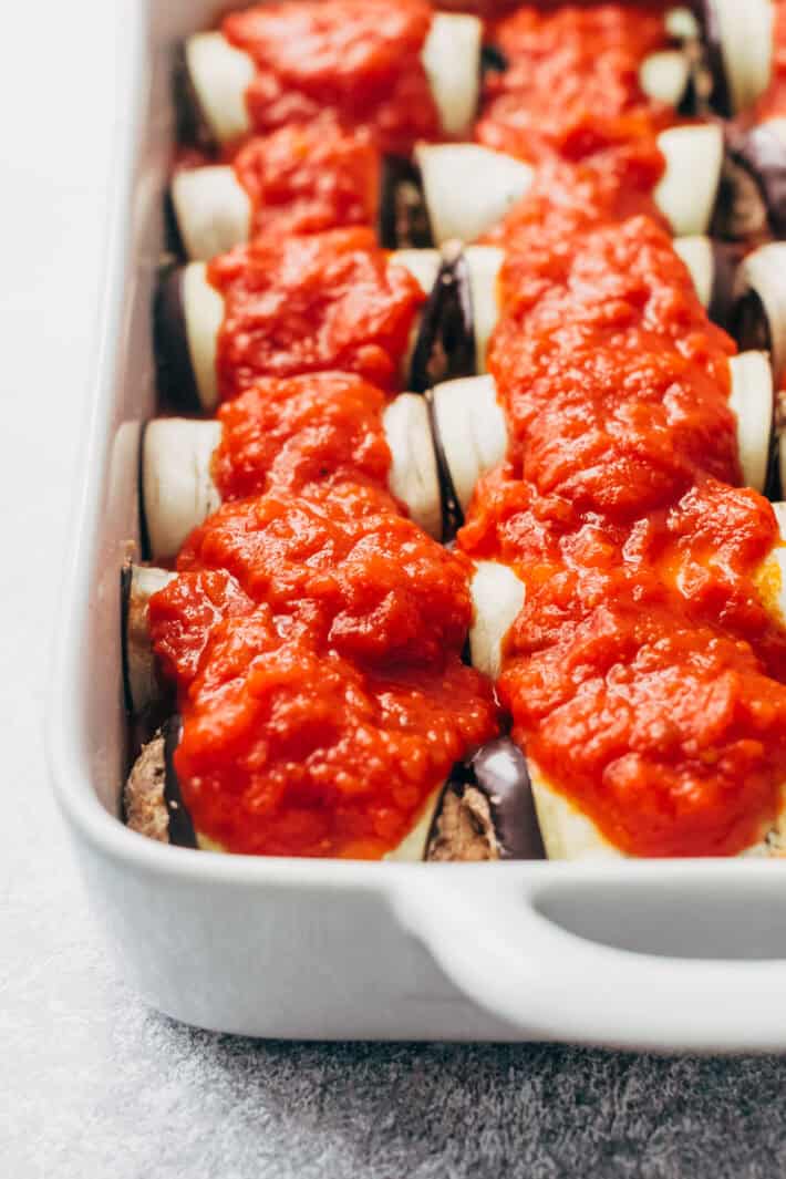 sauce over lasagna rolls