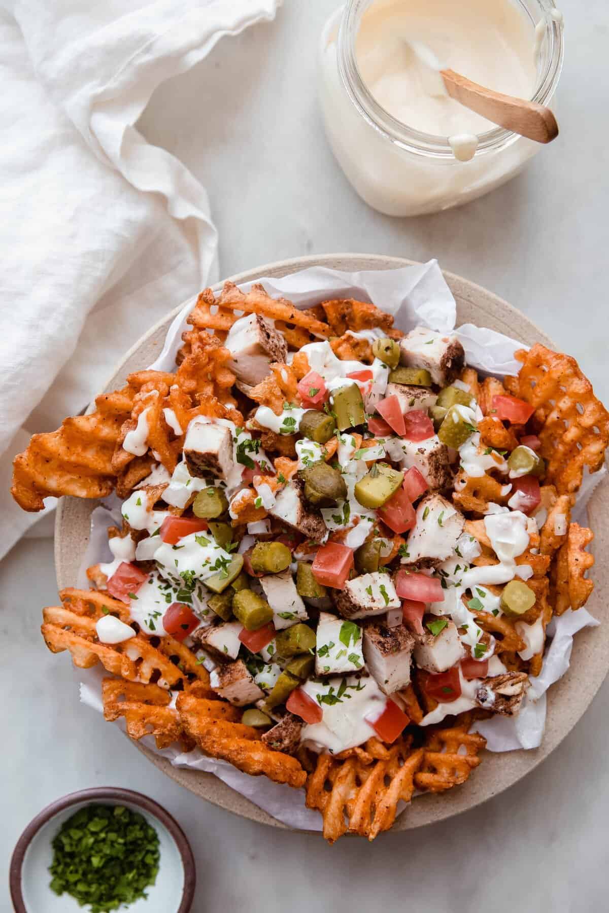Sheet Pan Chicken Shawarma Fries with Garlic Sauce