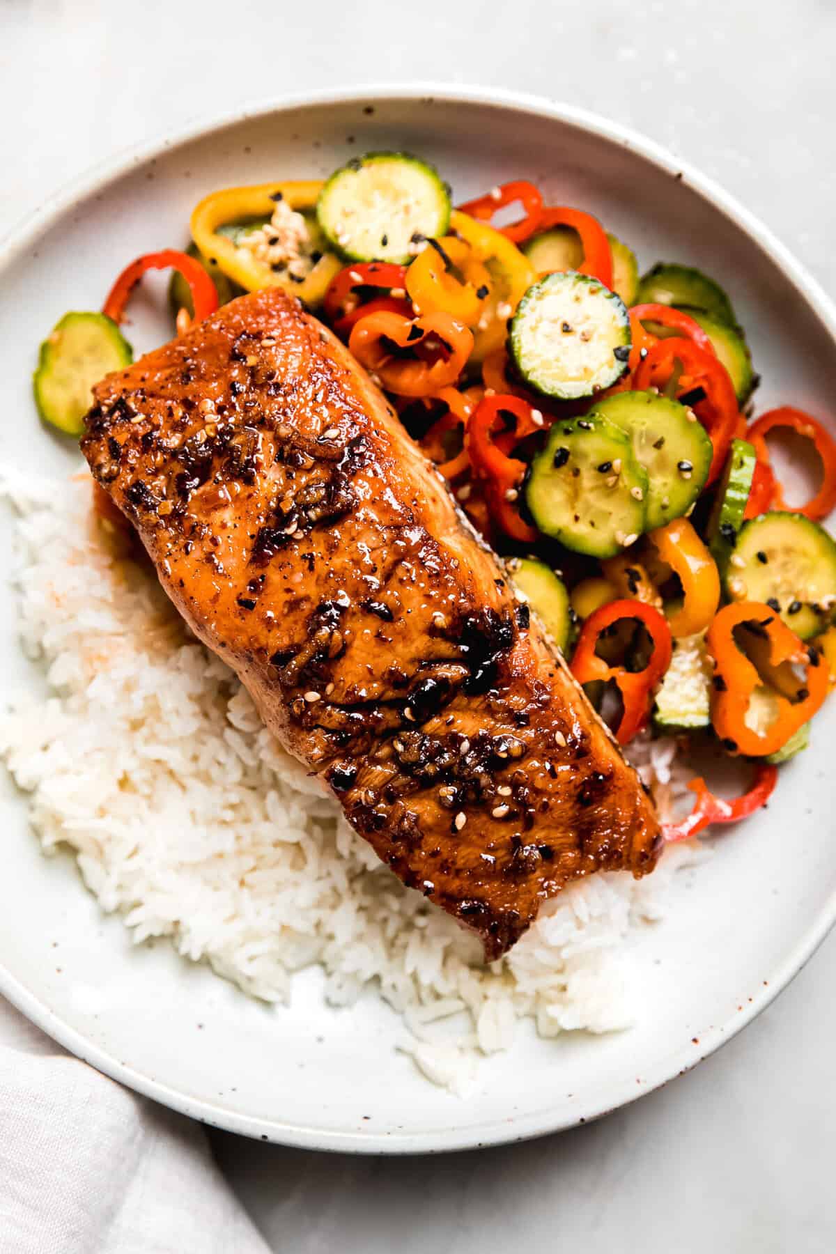 Chili Crisp Salmon with Cucumber Sweet Pepper Salad