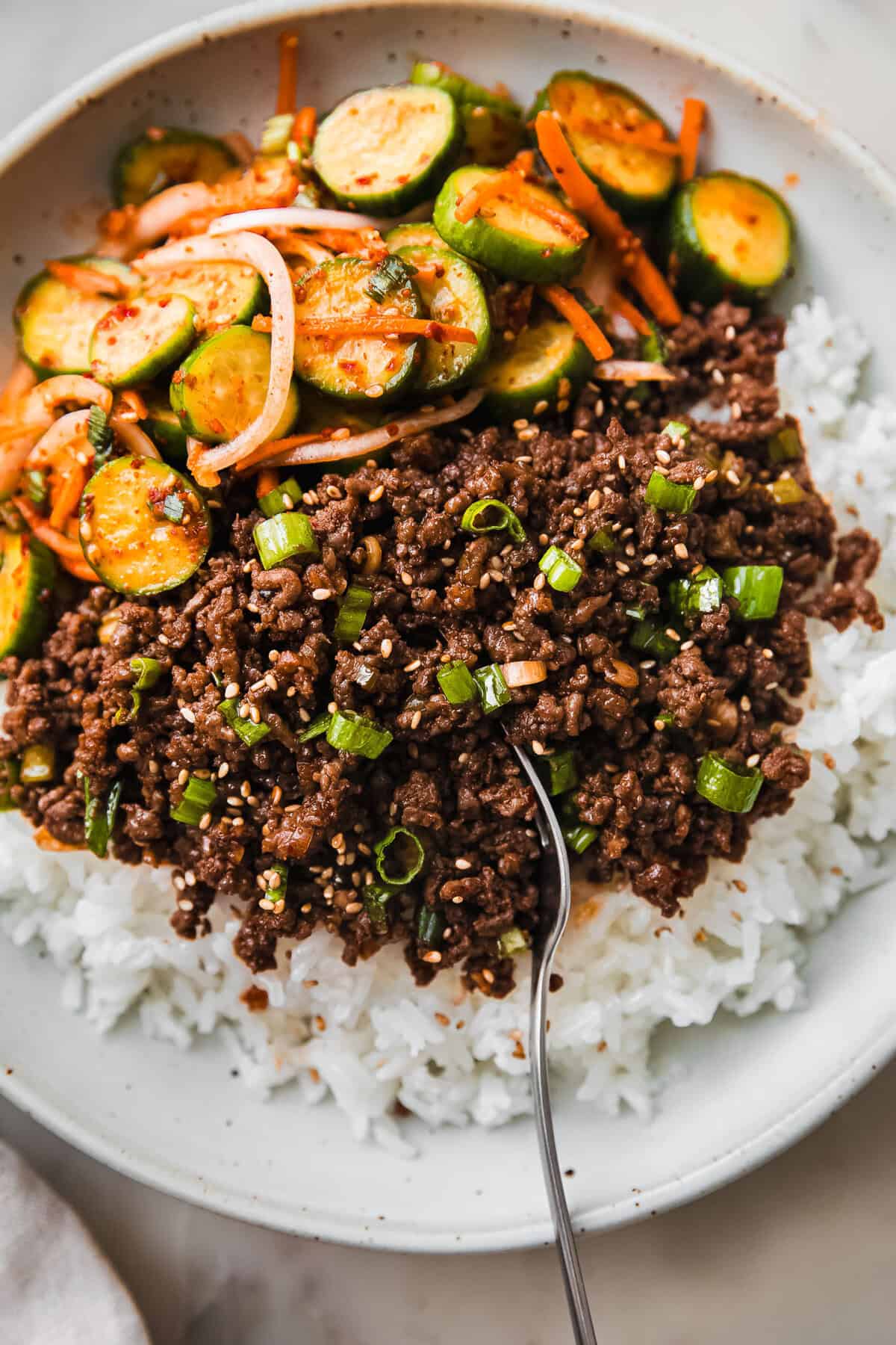 Gochujang Beef Bowls with Spicy Korean Cucumber Salad