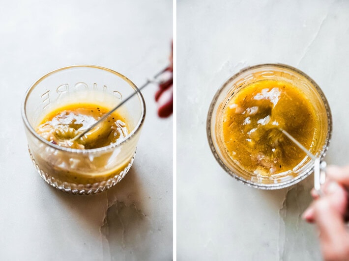 whisking the dressing in a container