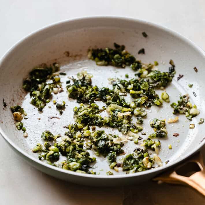 charred scallions in sautepan