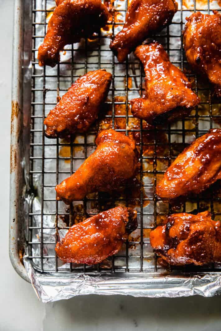 prepared wings tossed in gochujang sauce