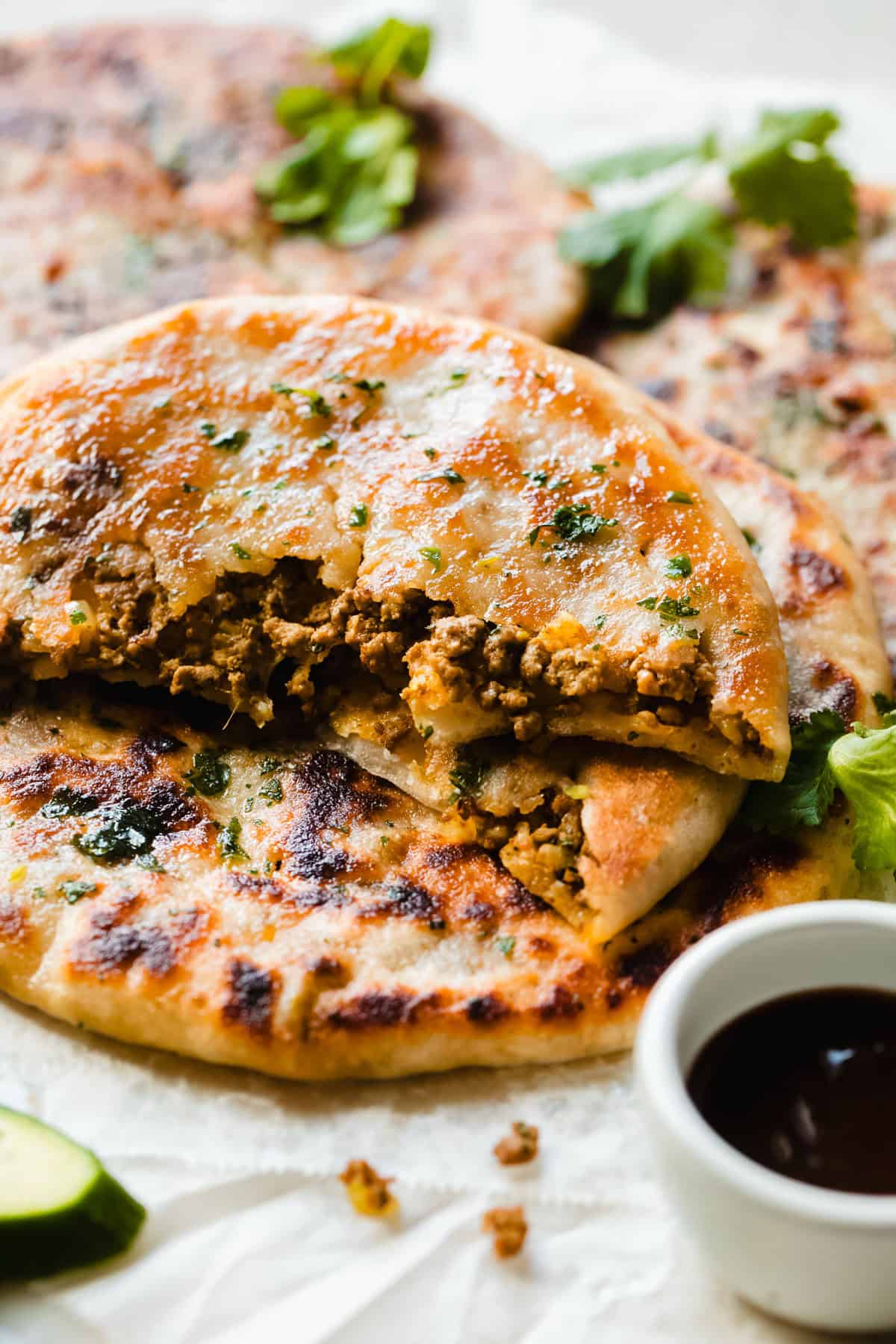 Halal ground beef egg naan flatbread topped for hearty savory quick breakfast