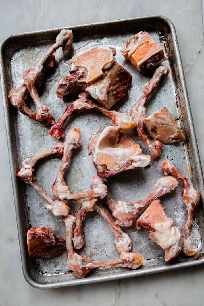 bones on sheet pan before roasting
