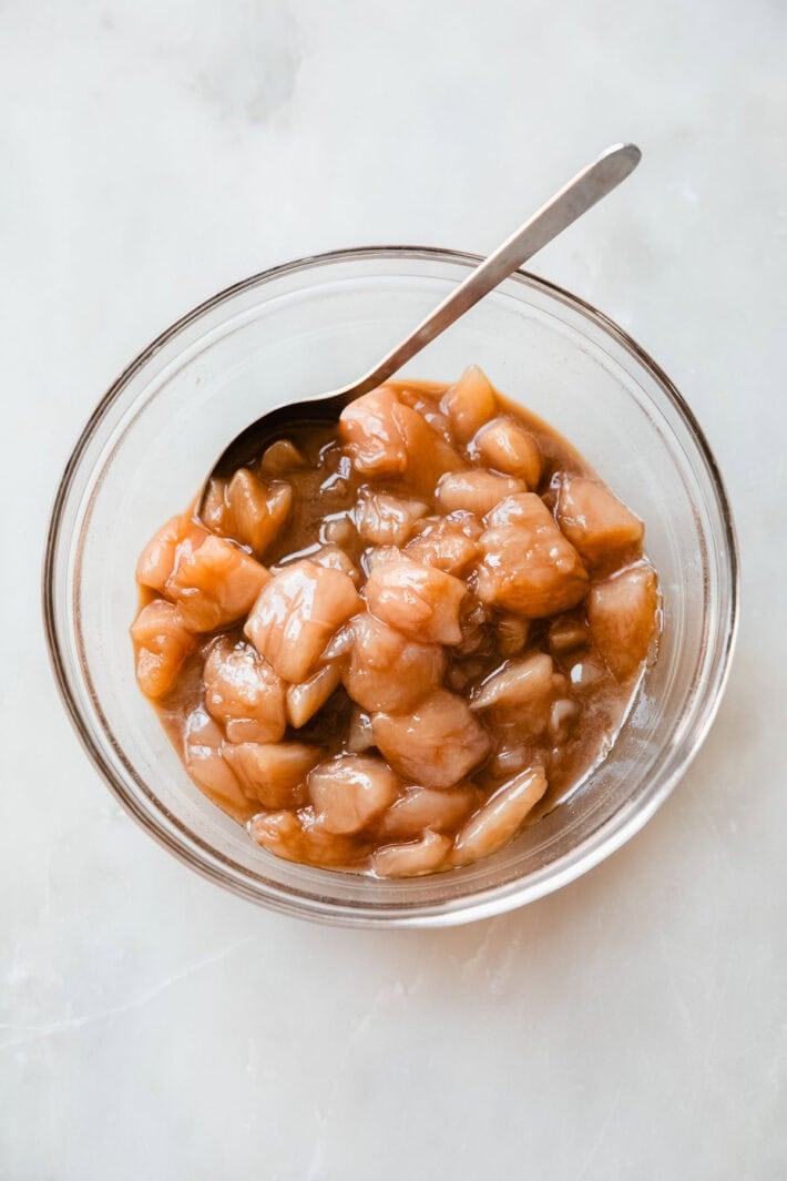 chicken tossed in seasonings and egg whites before frying