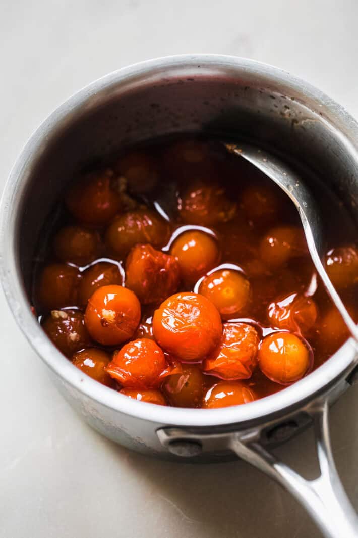 roasted tomato in sauce pan before adding to labneh