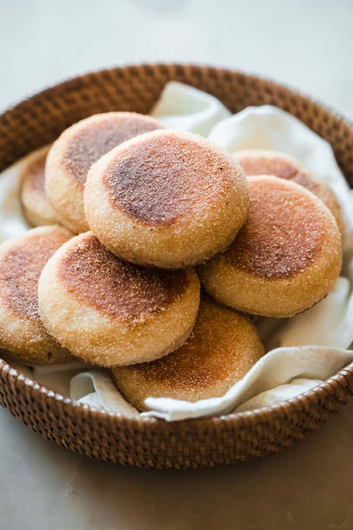 prepared sourdough English muffins in basket