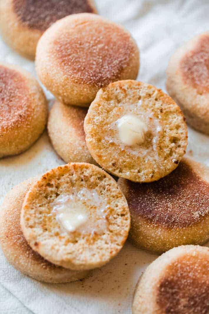 butter English muffins on white tea towel