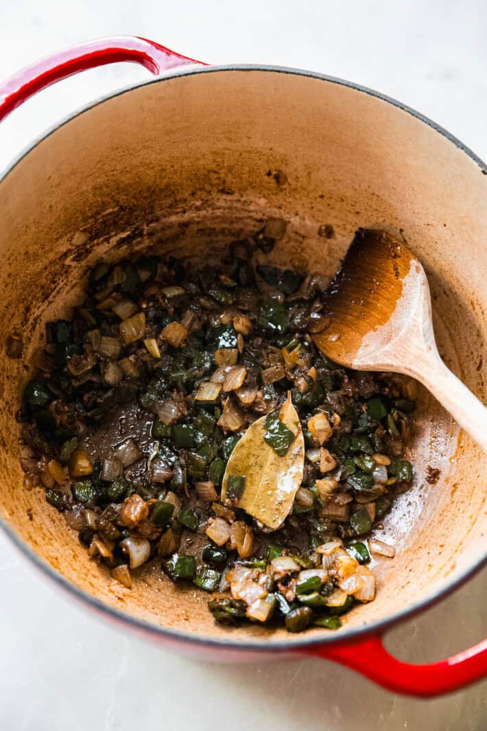 sautéed onions and poblano peppers in dutch oven