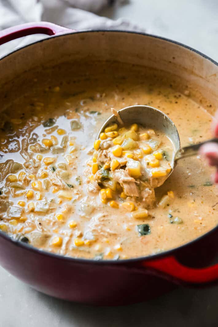 chicken and corn chowder on ladle